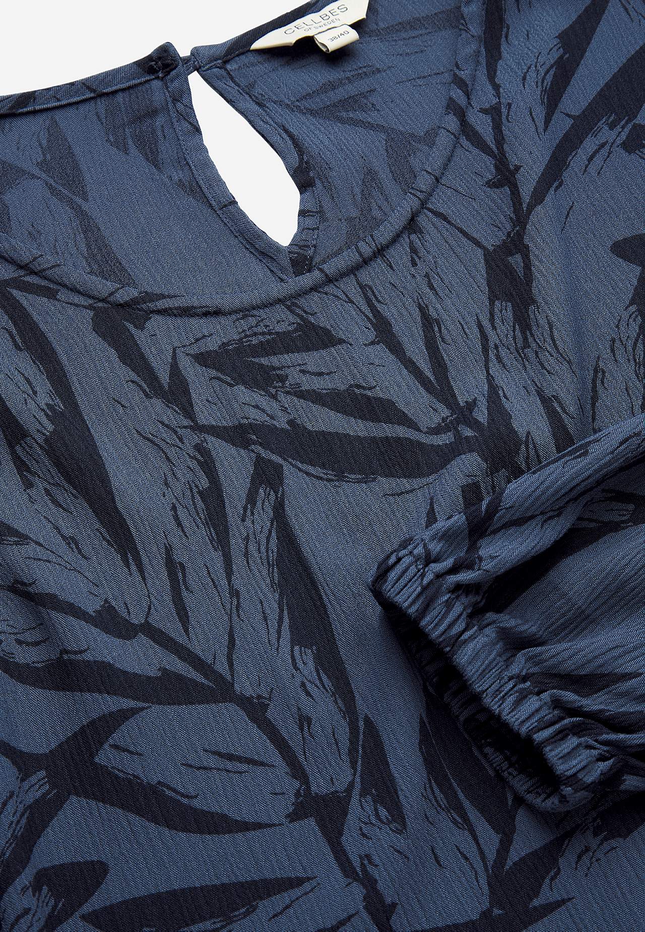 Tunic with textured weave fabric