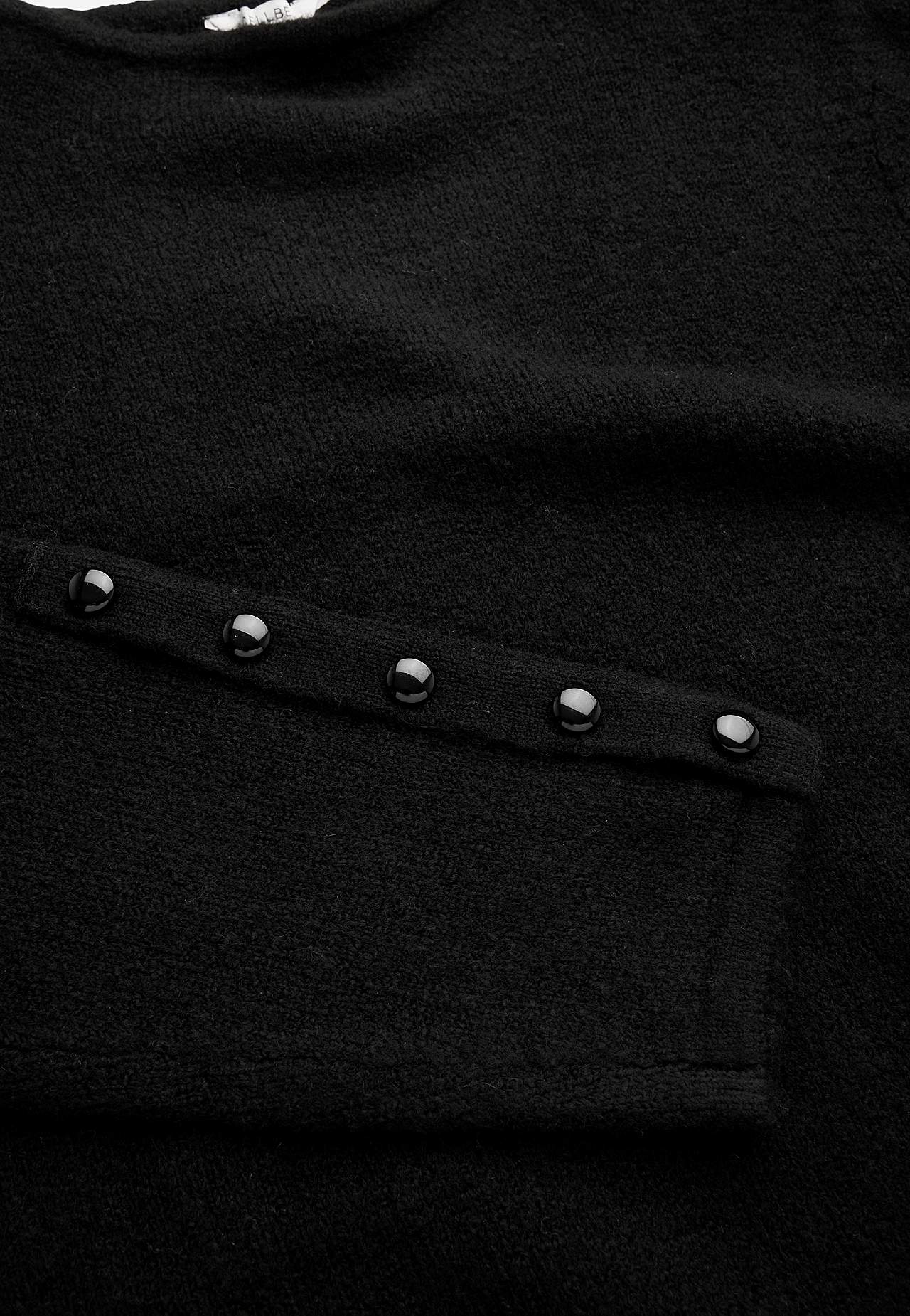 Knitted tunic with vent