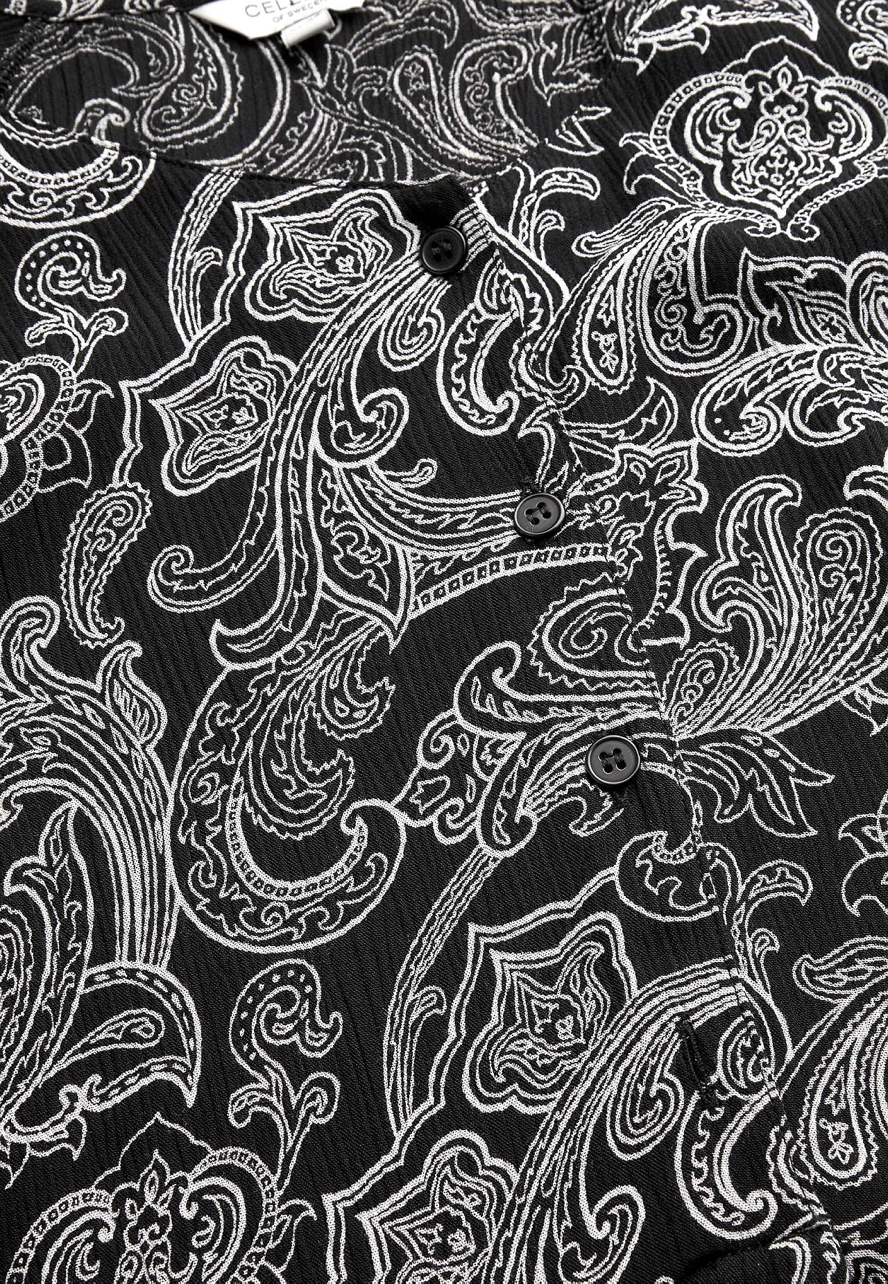 Patterned dress with buttons