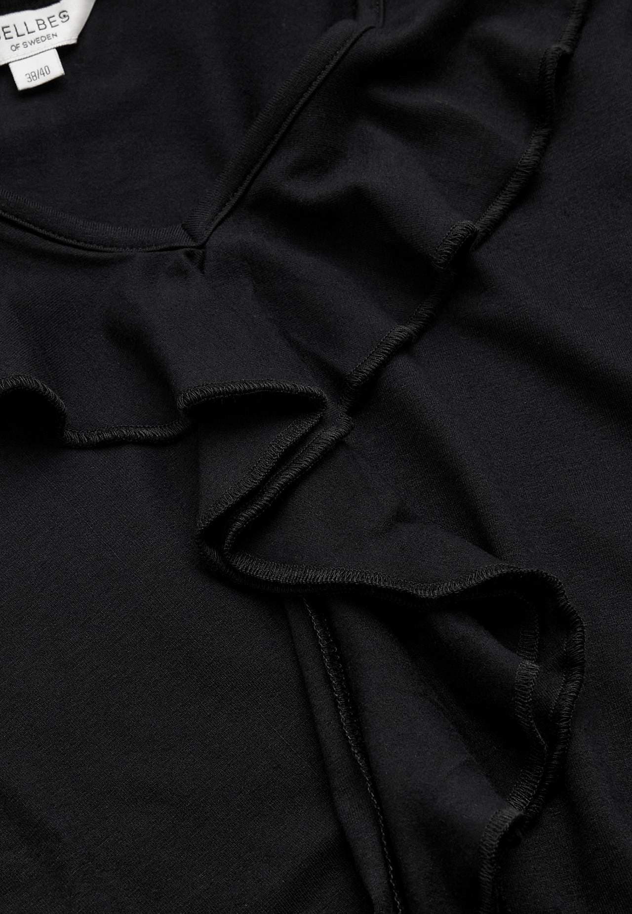 V-neck top with frill edge