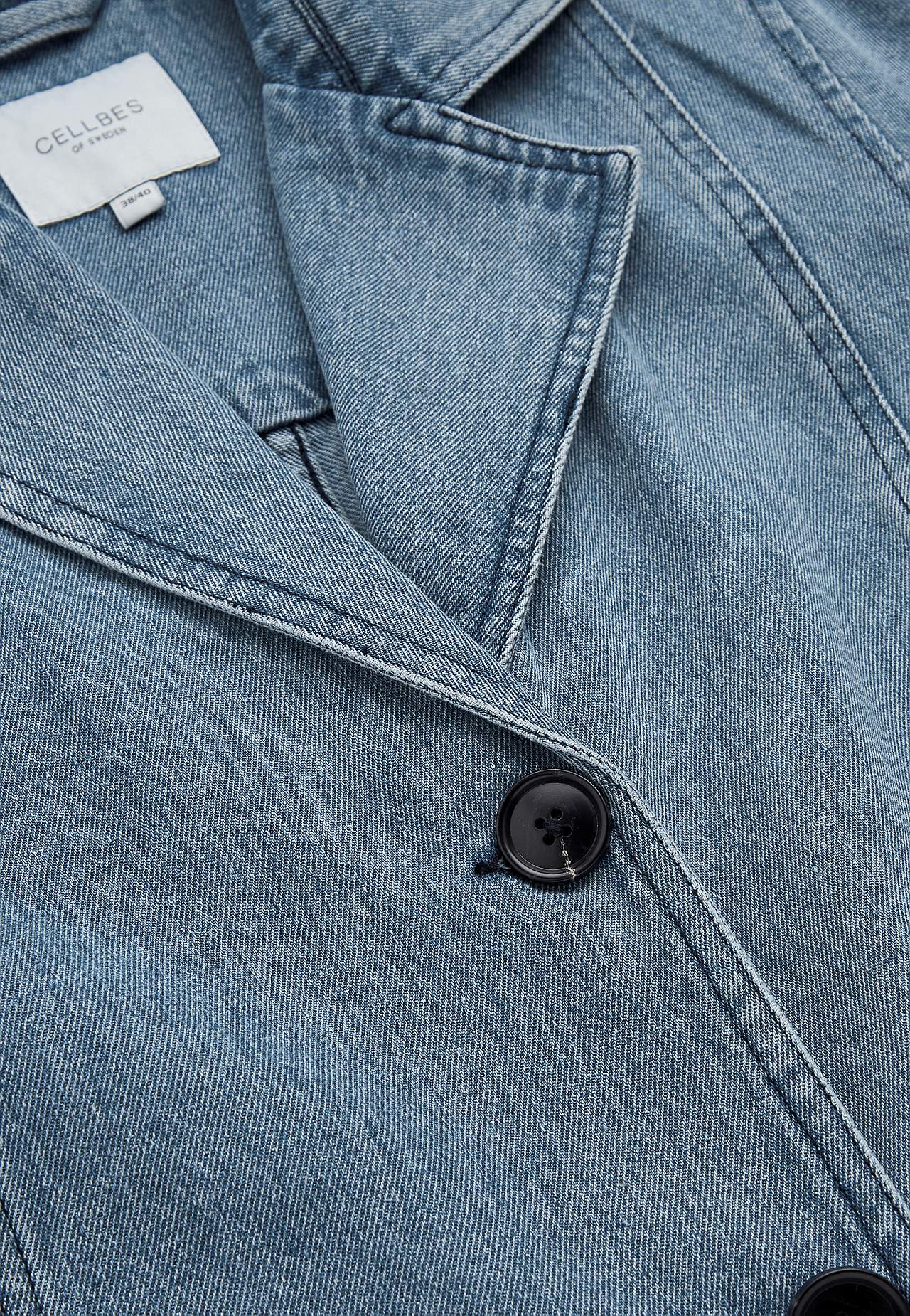 Coat in denim with belt tie