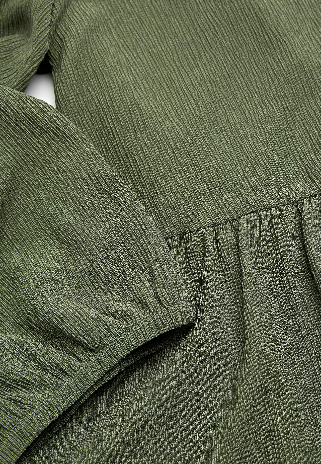 Jersey dress with structural pattern