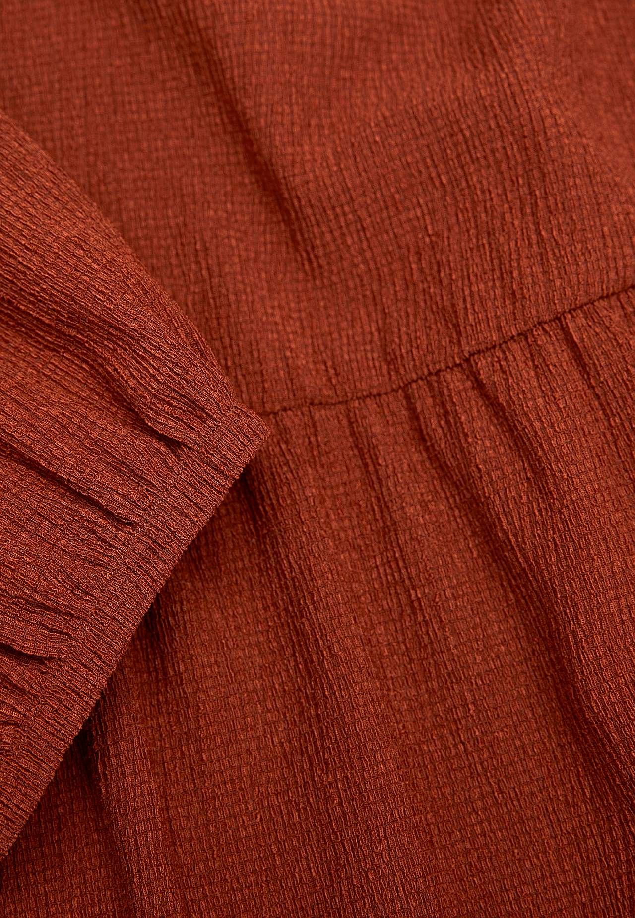 Jersey dress with structural pattern