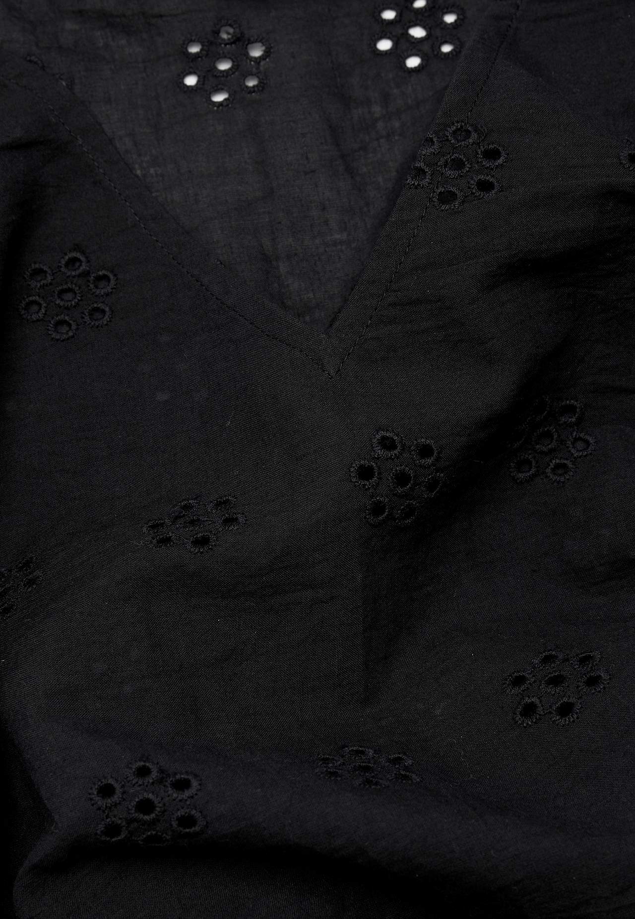 Tunic with hole embroidery