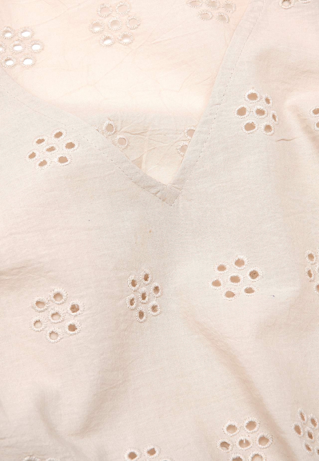 Tunic with hole embroidery