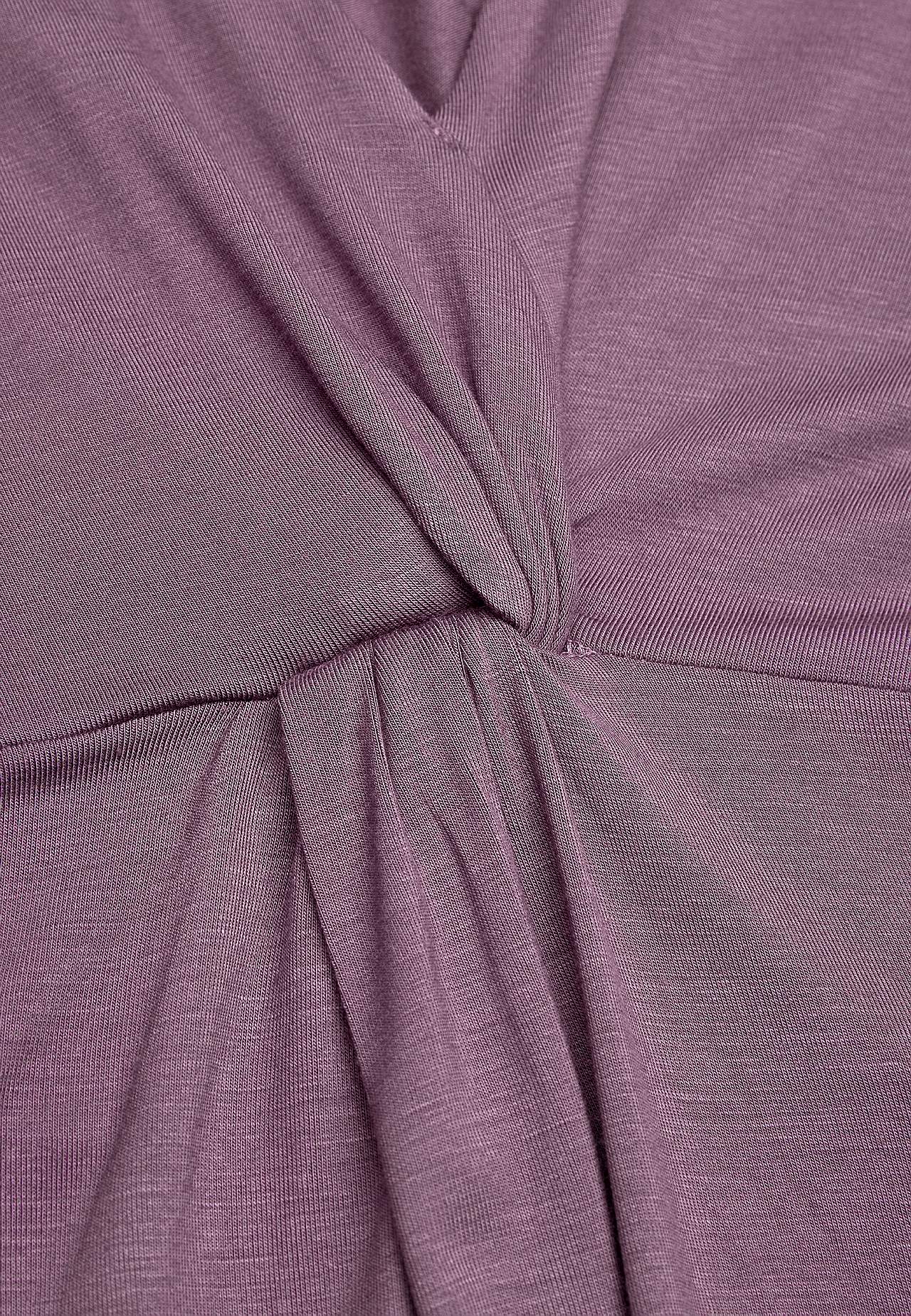 V-neck tunic with twisted gathering