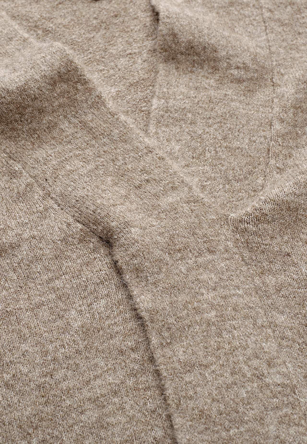 Knitted tunic with twisted detail