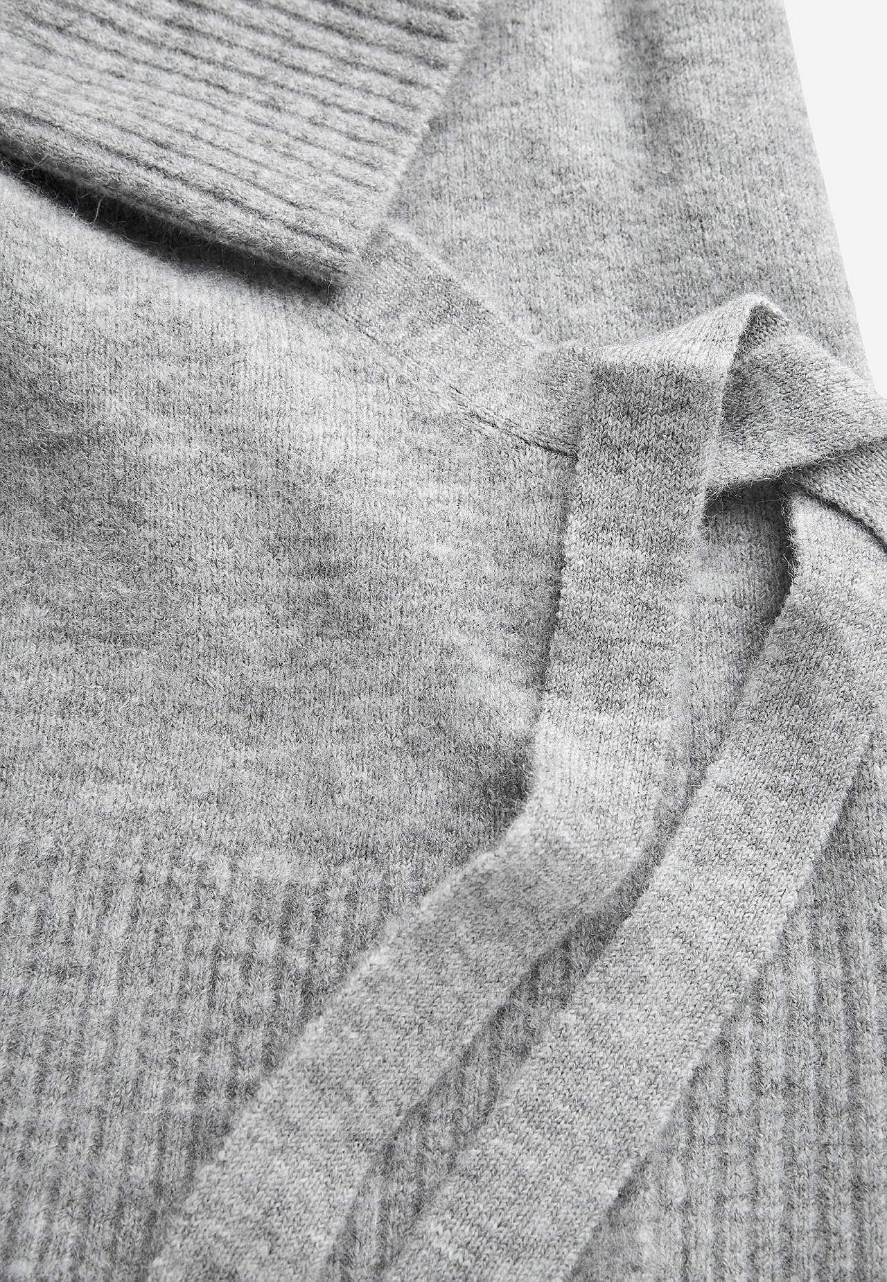 Knitted cardigan with wrap design