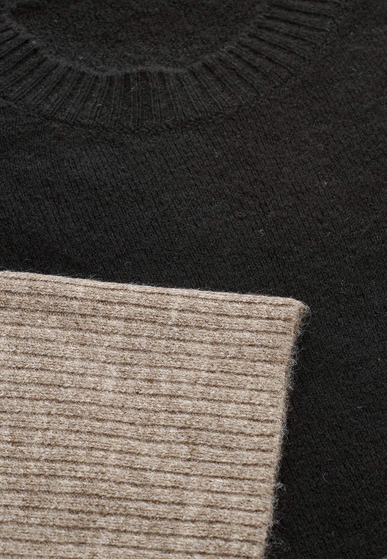 Knitted sweater with slits