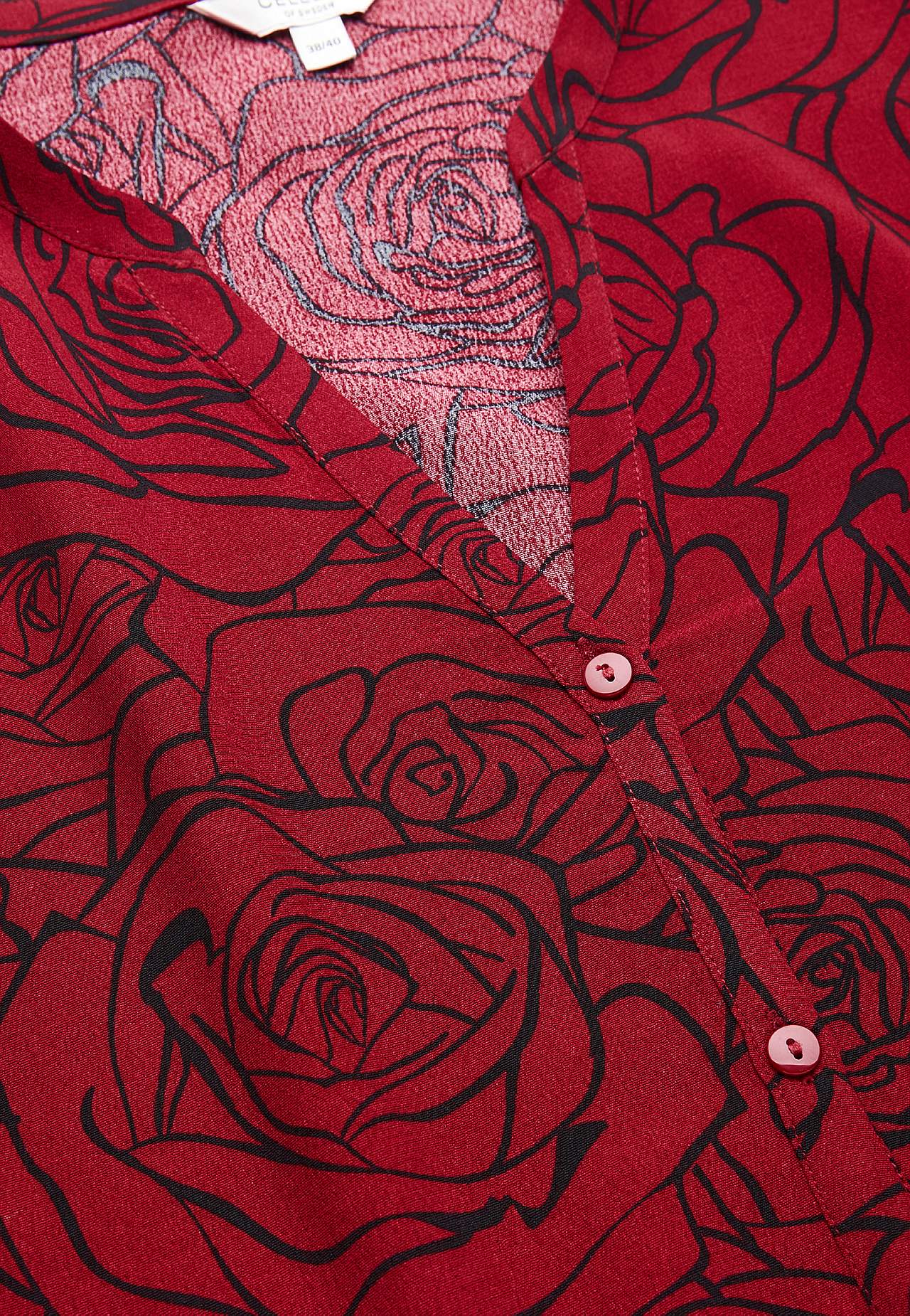 Dress in viscose with a flower pattern