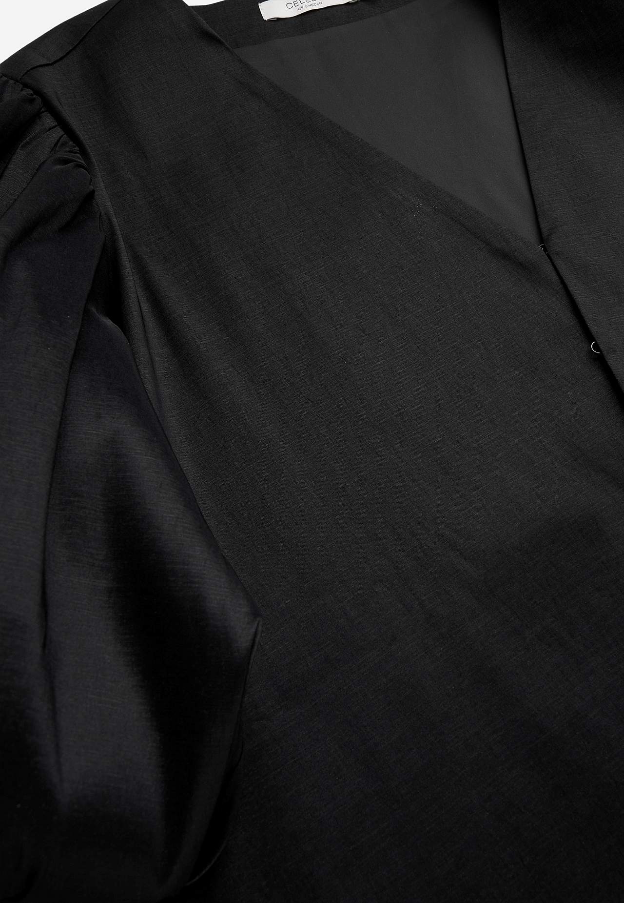 Inner jacket with voluminous sleeves