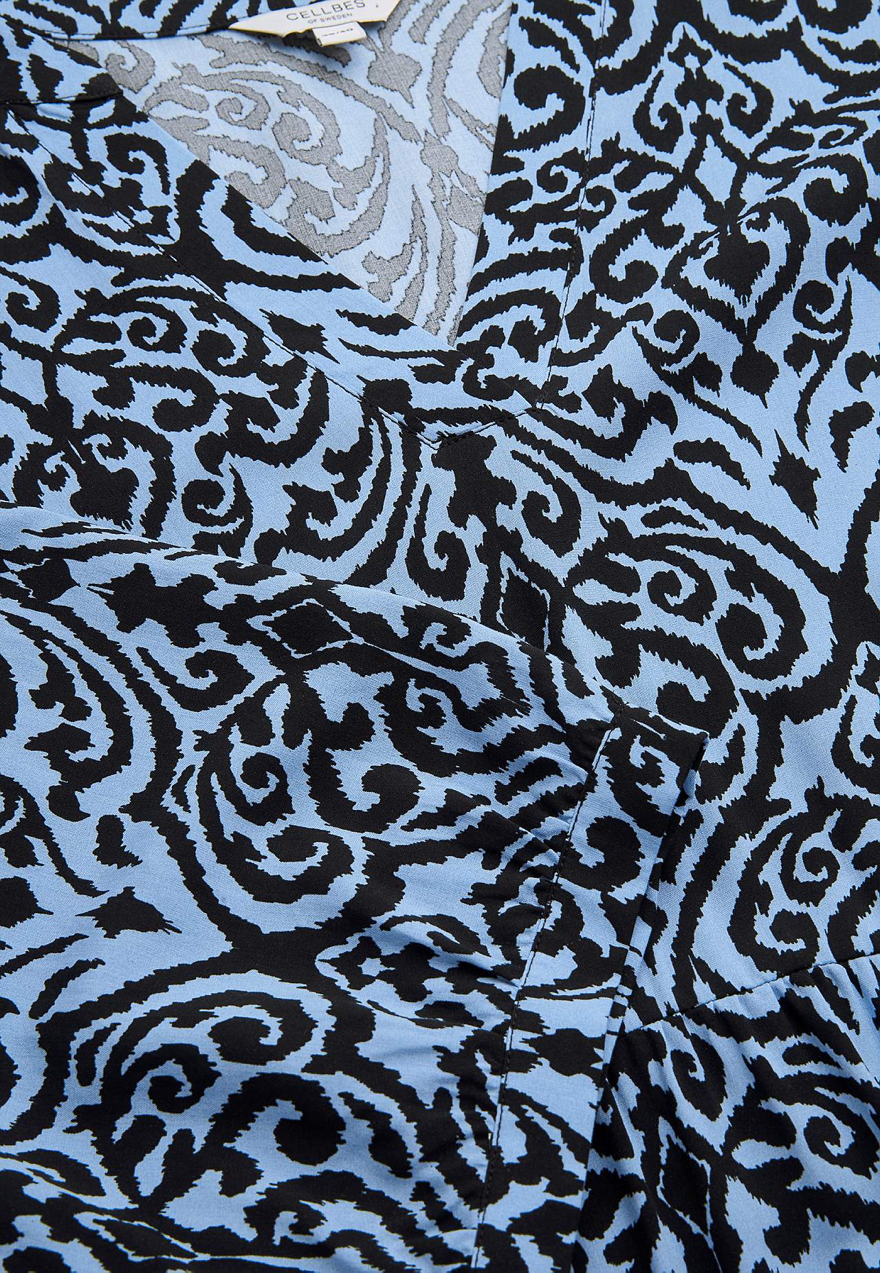 Dress with flounces