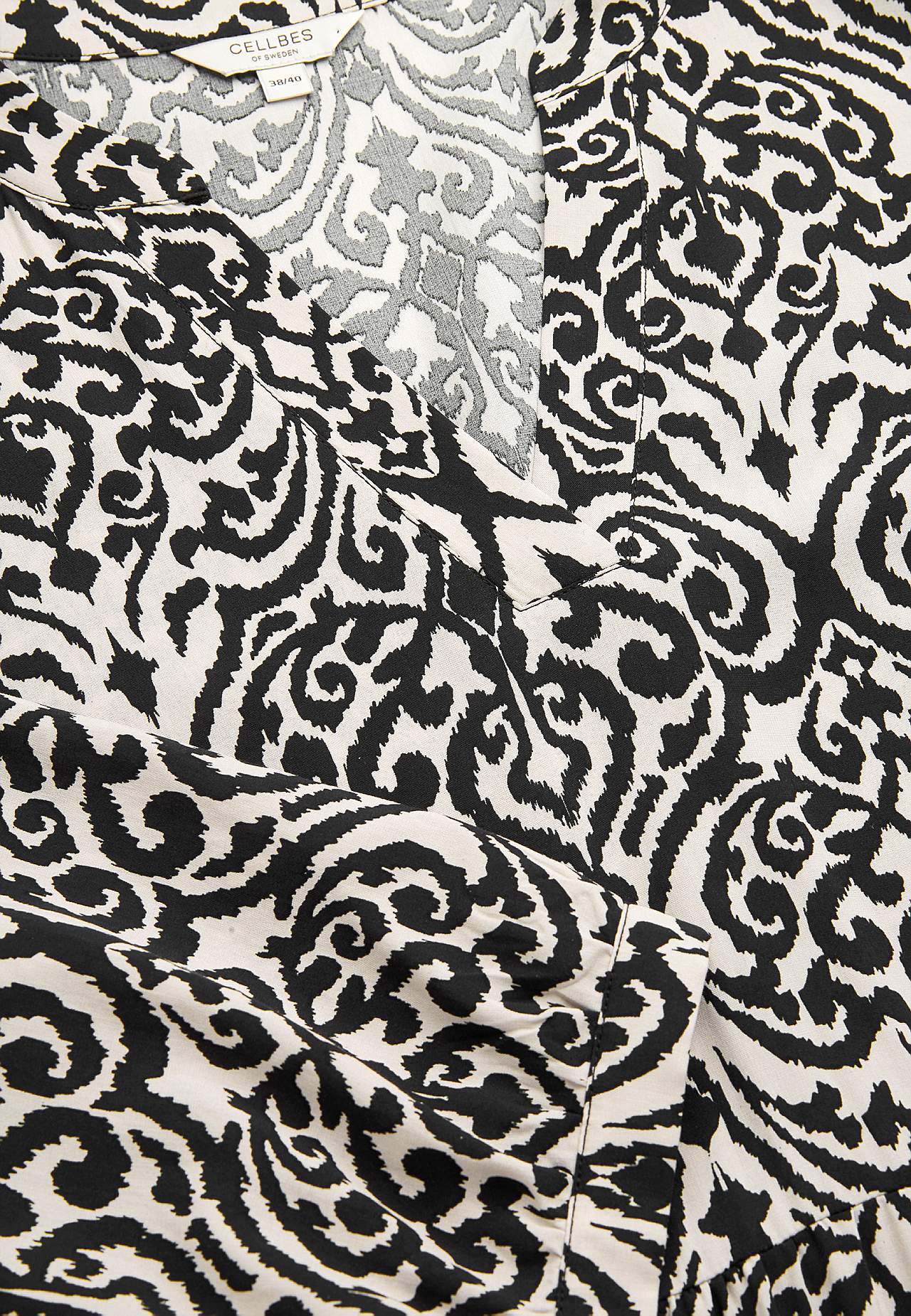 Dress with flounces