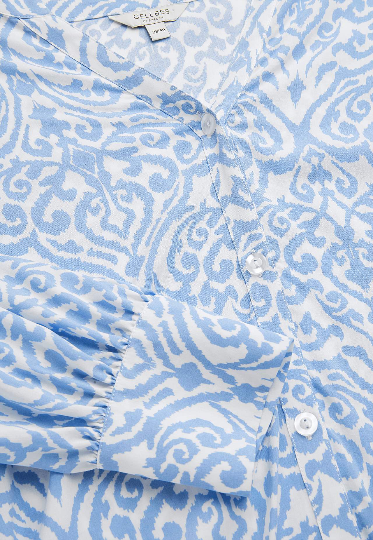 Woven tunic with buttons
