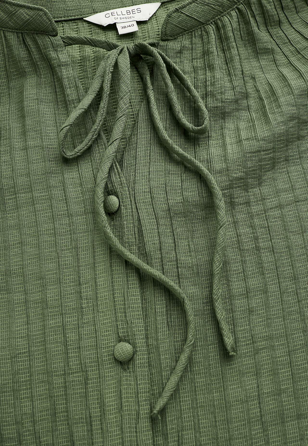 Woven tunic with structure