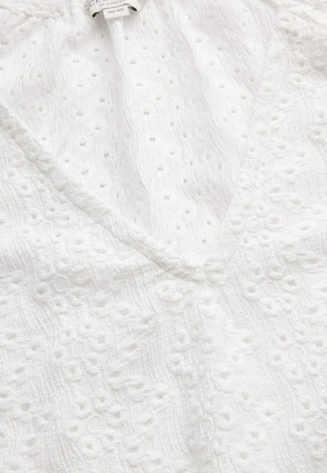 Jersey tuniq with hole embroidery