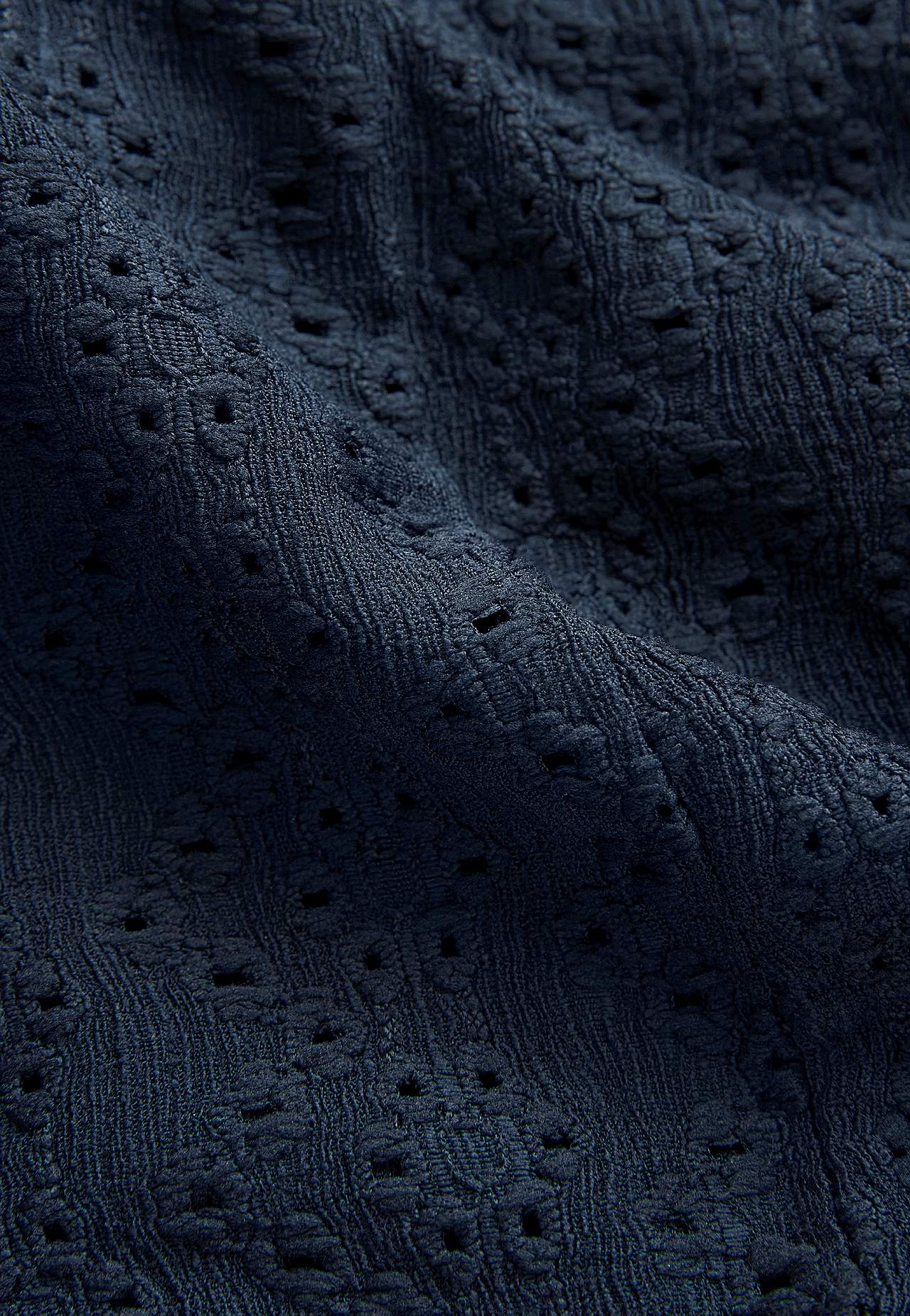 Jersey top with hole embroidery