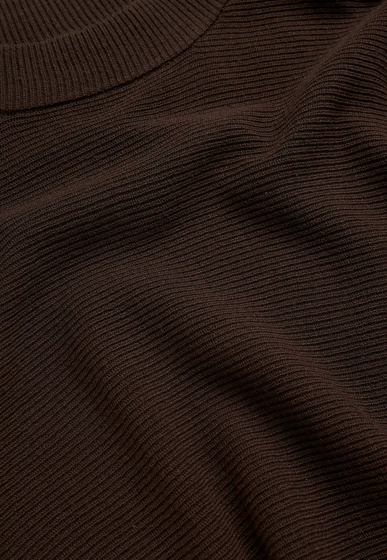 Finstickad poncho