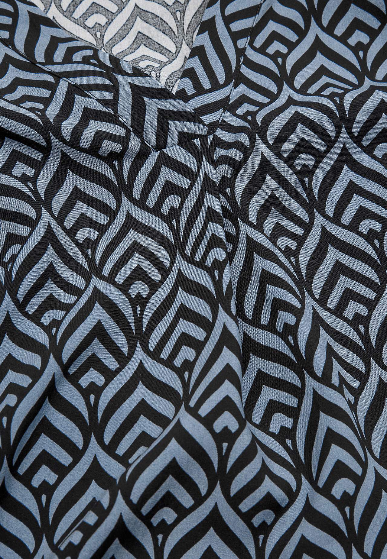 V-neck, woven blouse