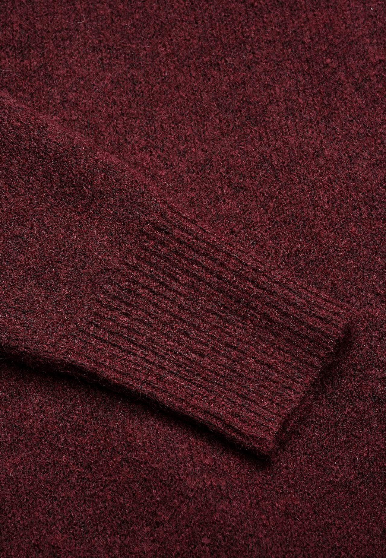 Knitted tunic with slits