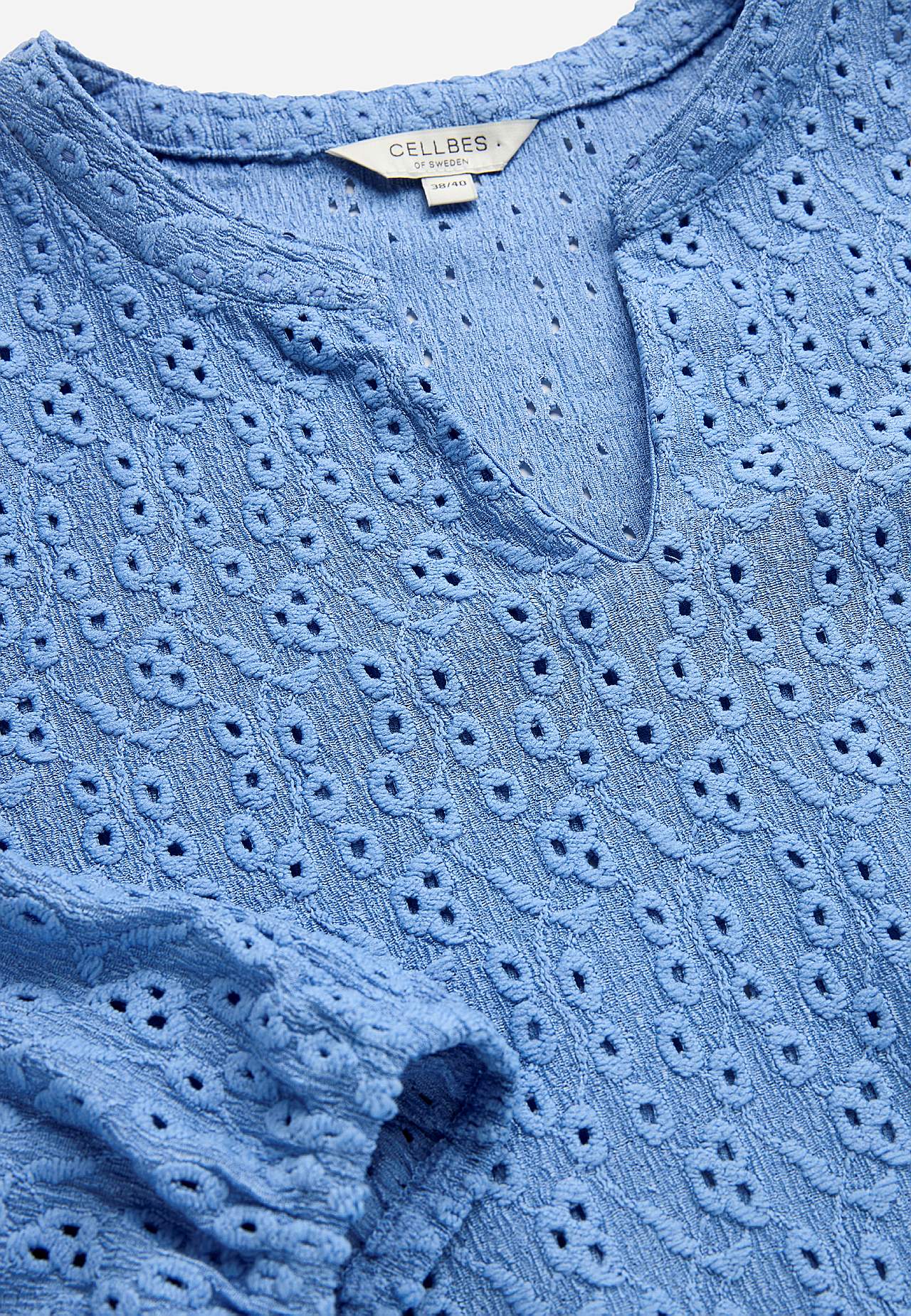 Jersey top with embroidered openwork