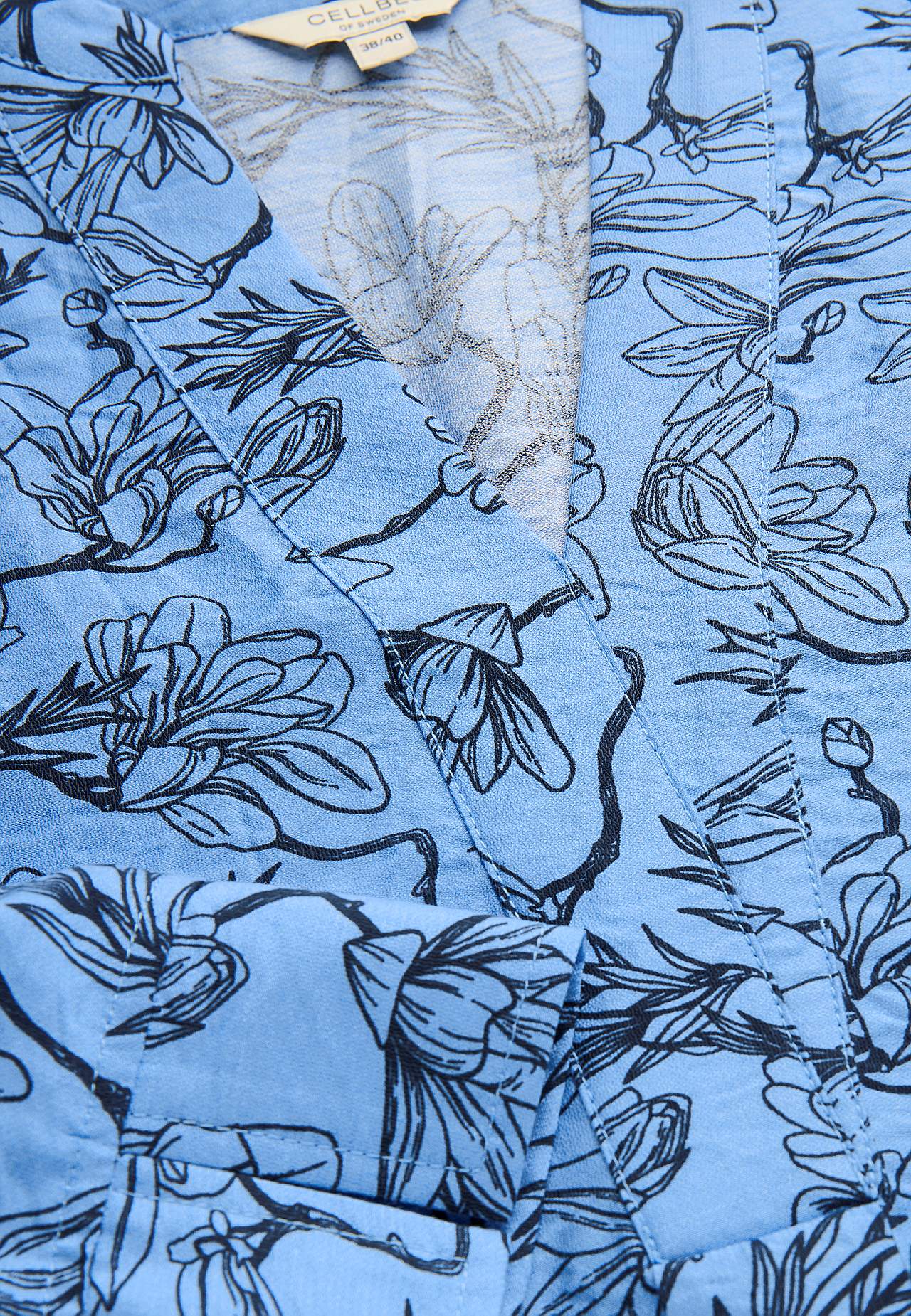 Woven tunic top with pockets