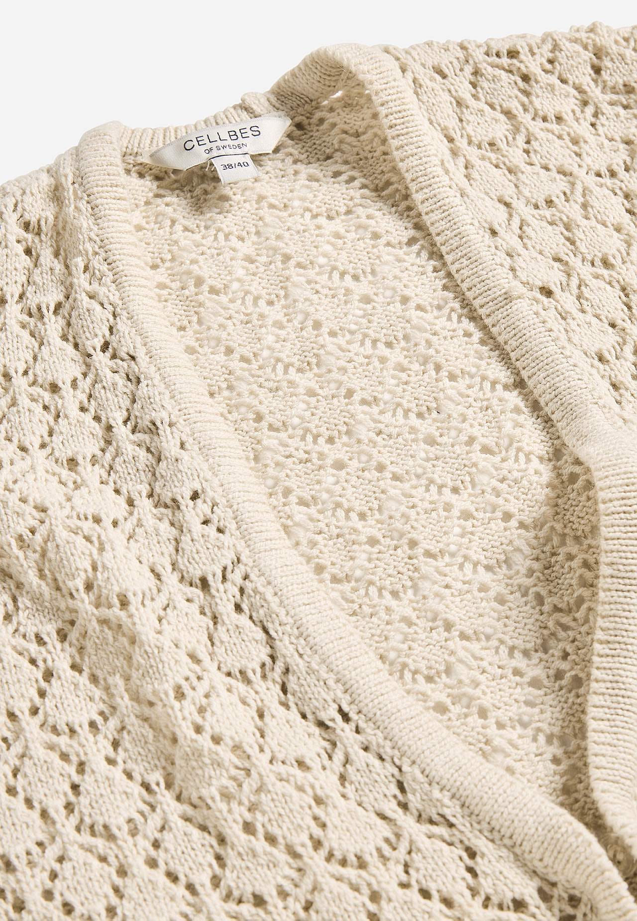 Knitted cardigan with openwork