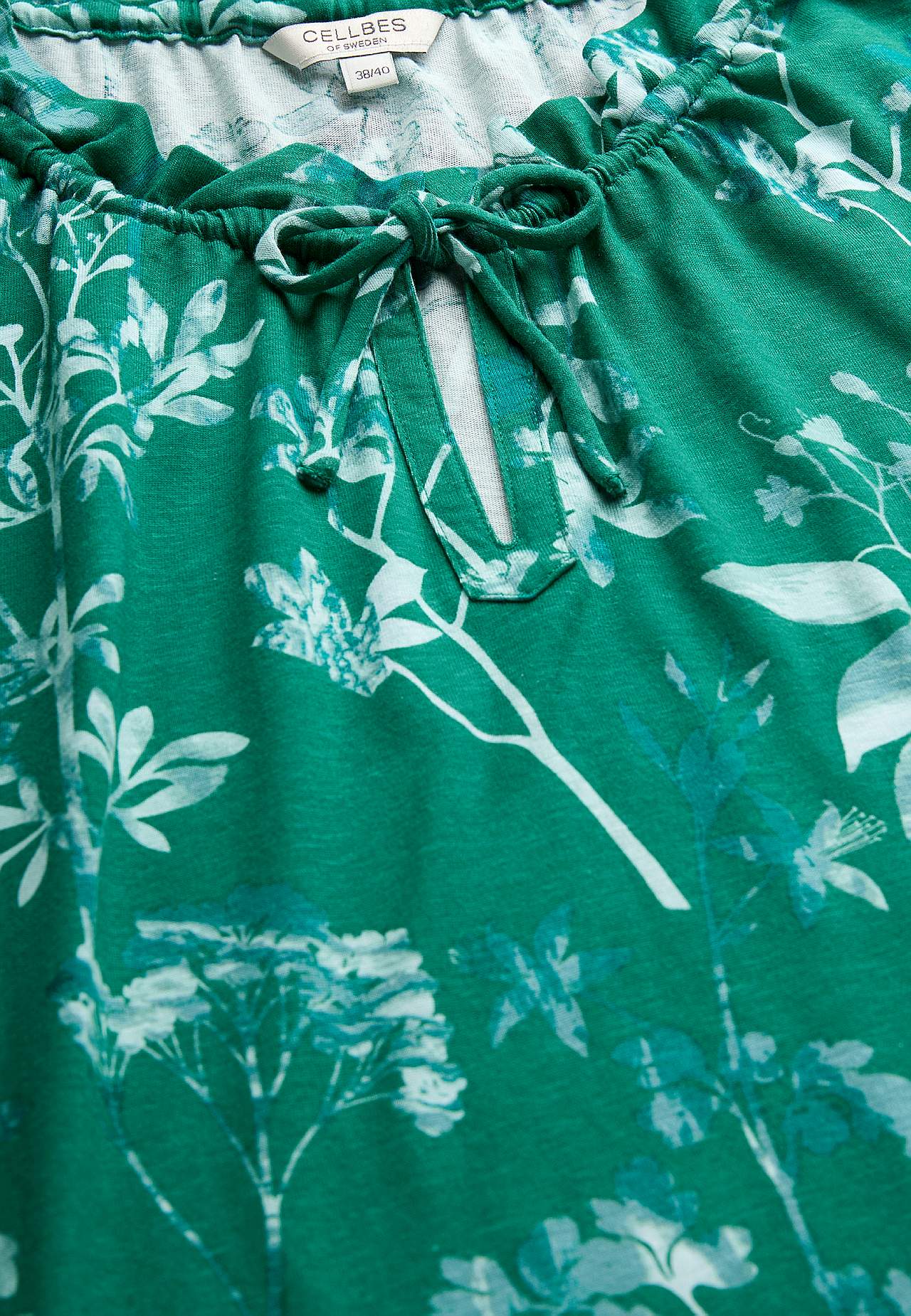 Patterned jersey top with frill edge