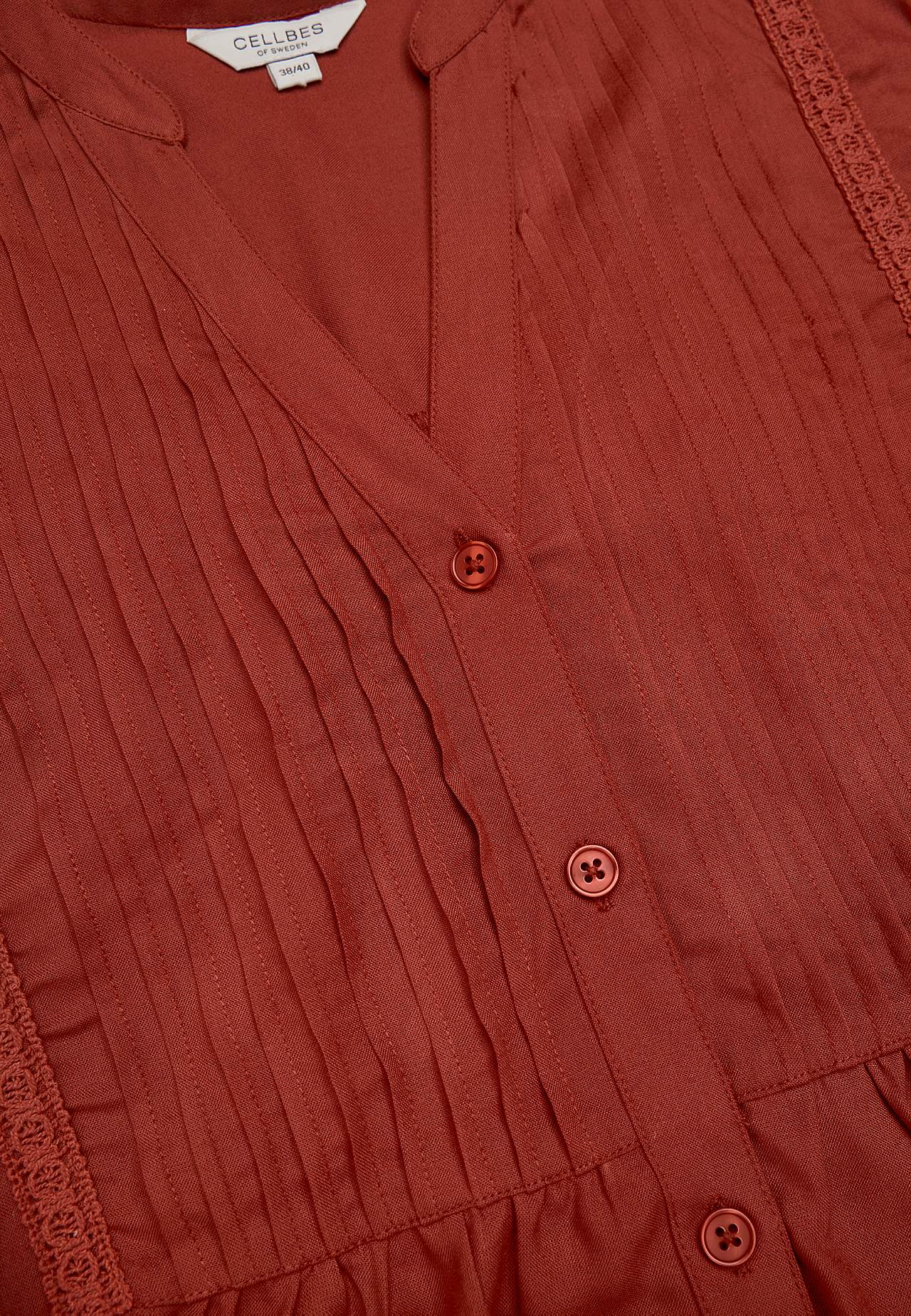 Woven tunic with lace trims