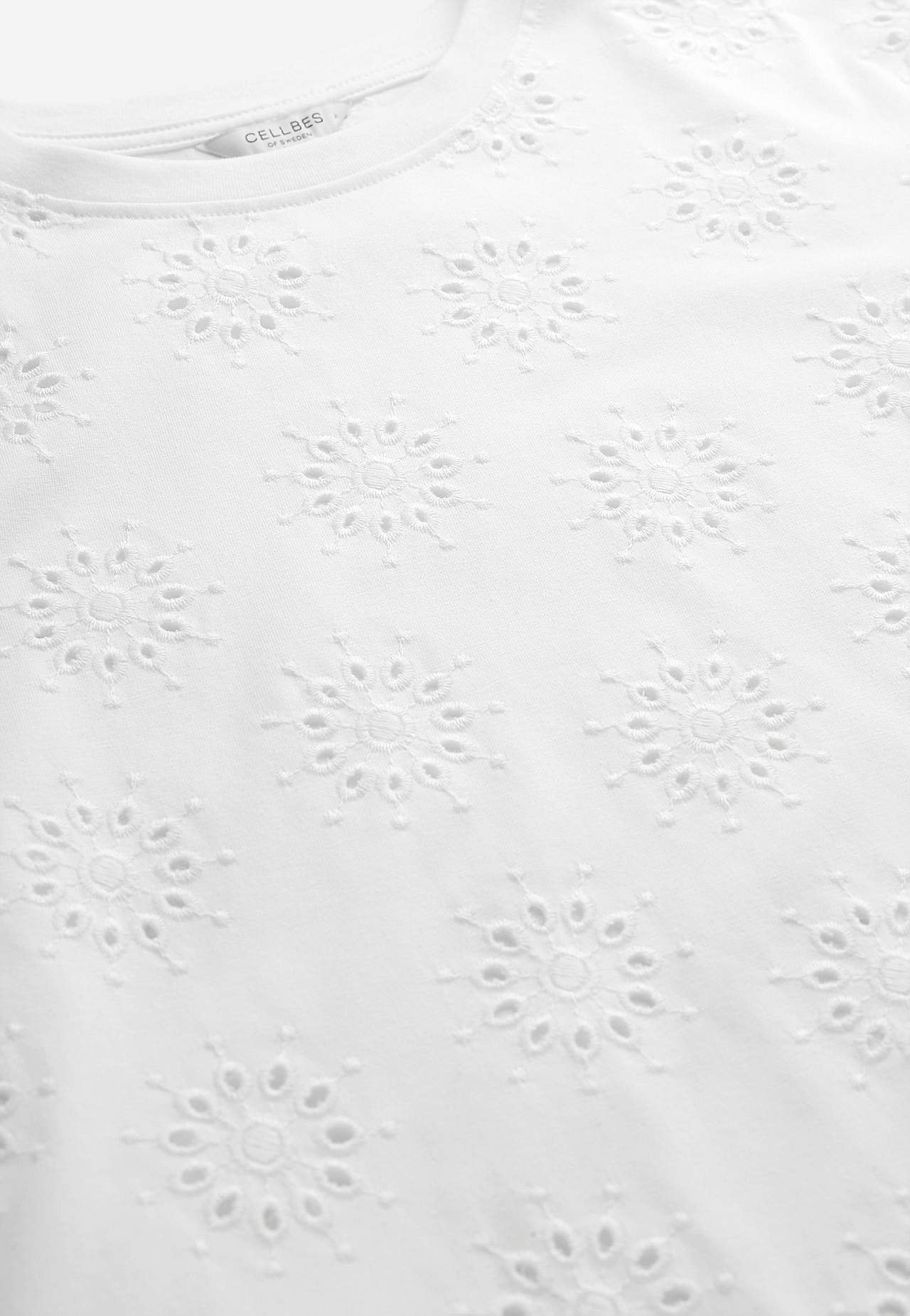 Jersey top with embroidered openwork