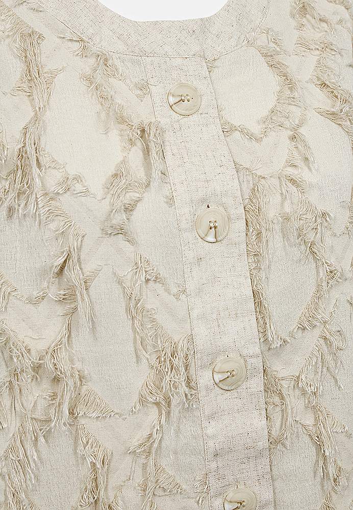 Jacquard-neuloksinen takki tupsudetaljeilla