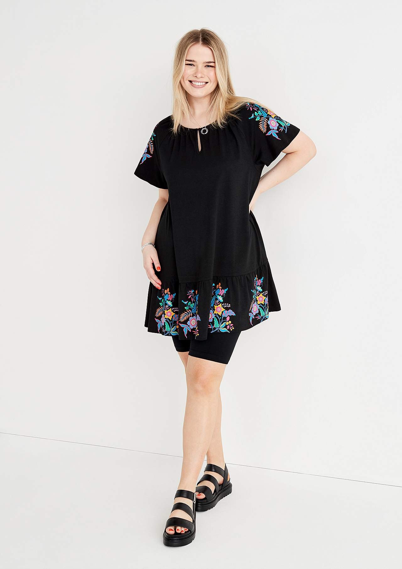 Tunic with frill at the bottom