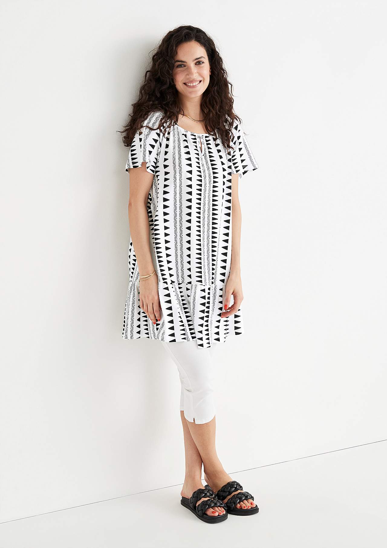 Tunic with frill at the bottom