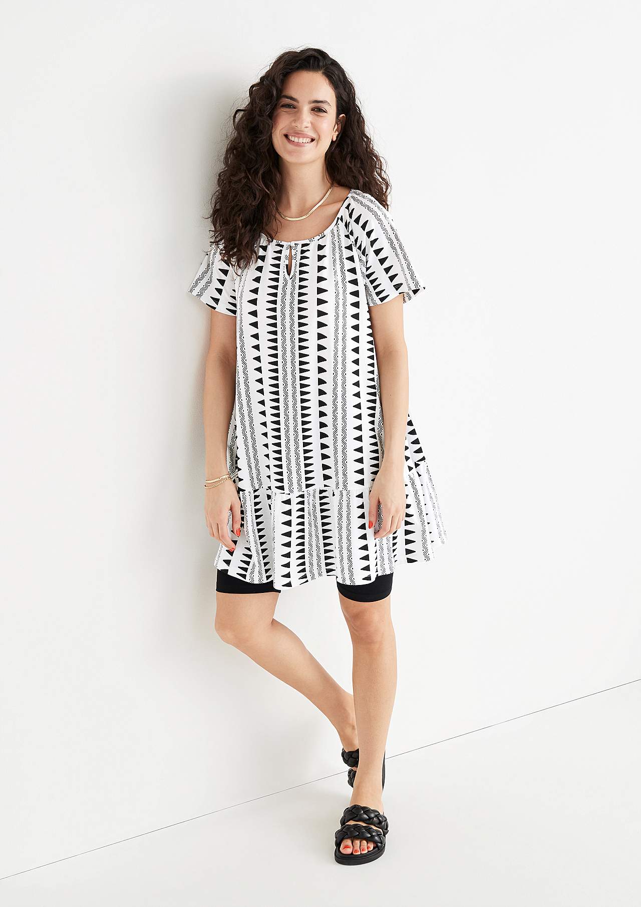 Tunic with frill at the bottom
