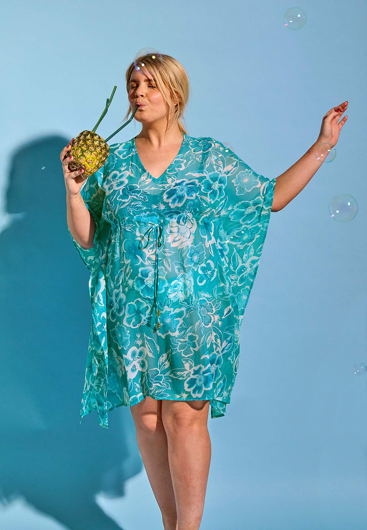 Beach caftan with a flower pattern