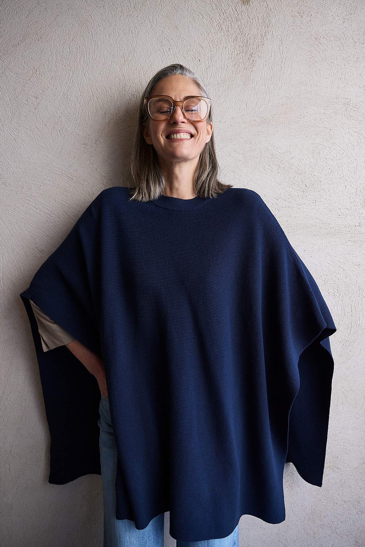 Fine-knitted poncho