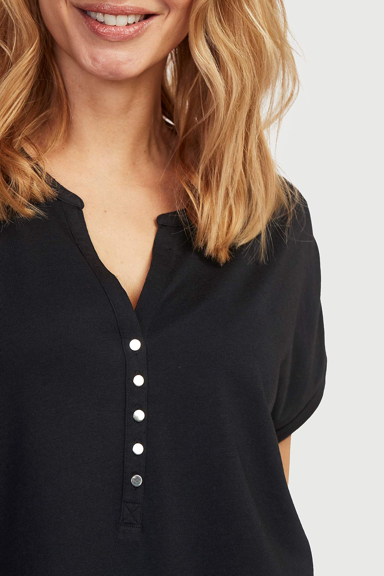 Jersey top with metallic buttons