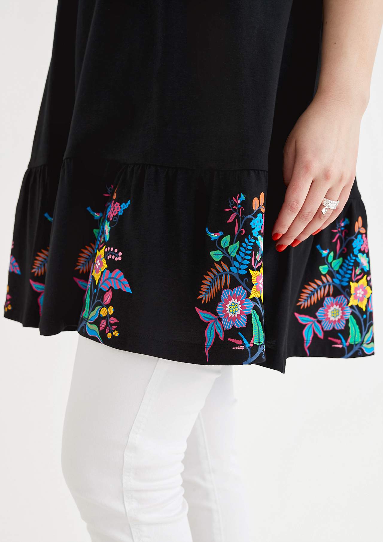 Tunic with frill at the bottom