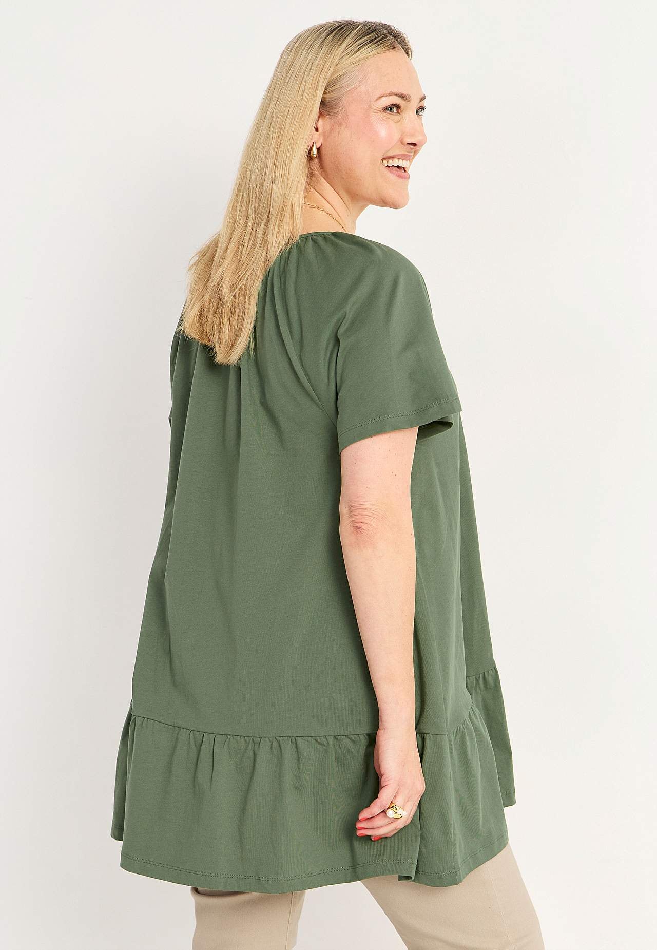 Tunic with frill at the bottom
