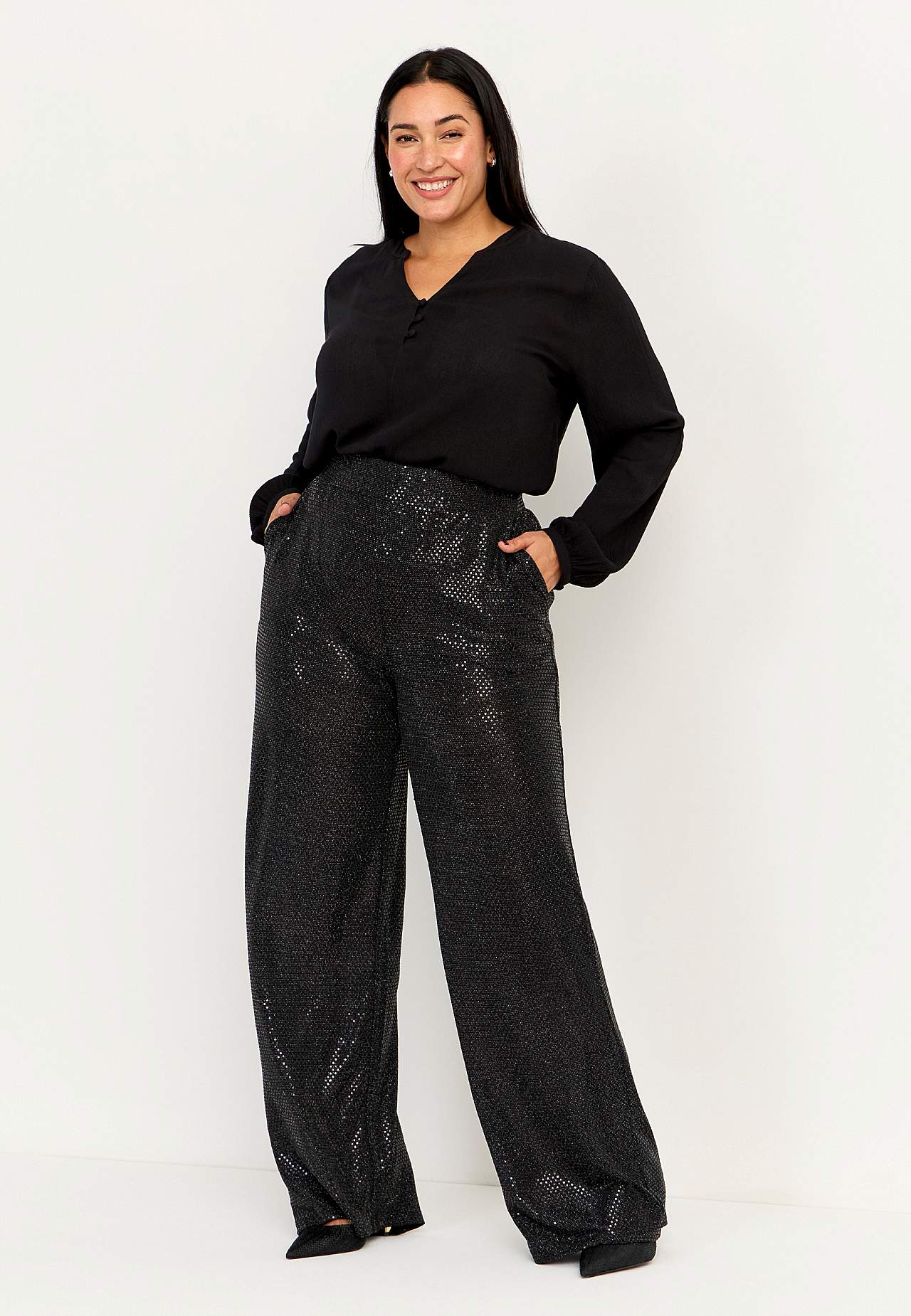 Party trousers with paillettes