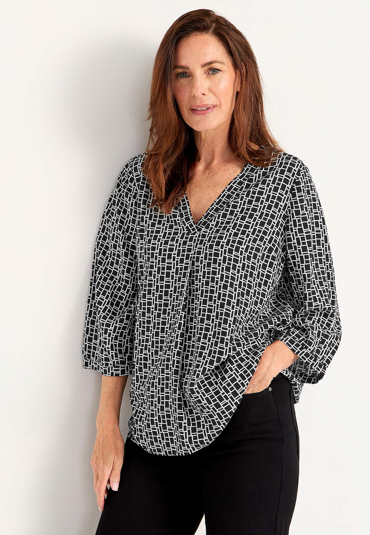 V-neck, woven blouse