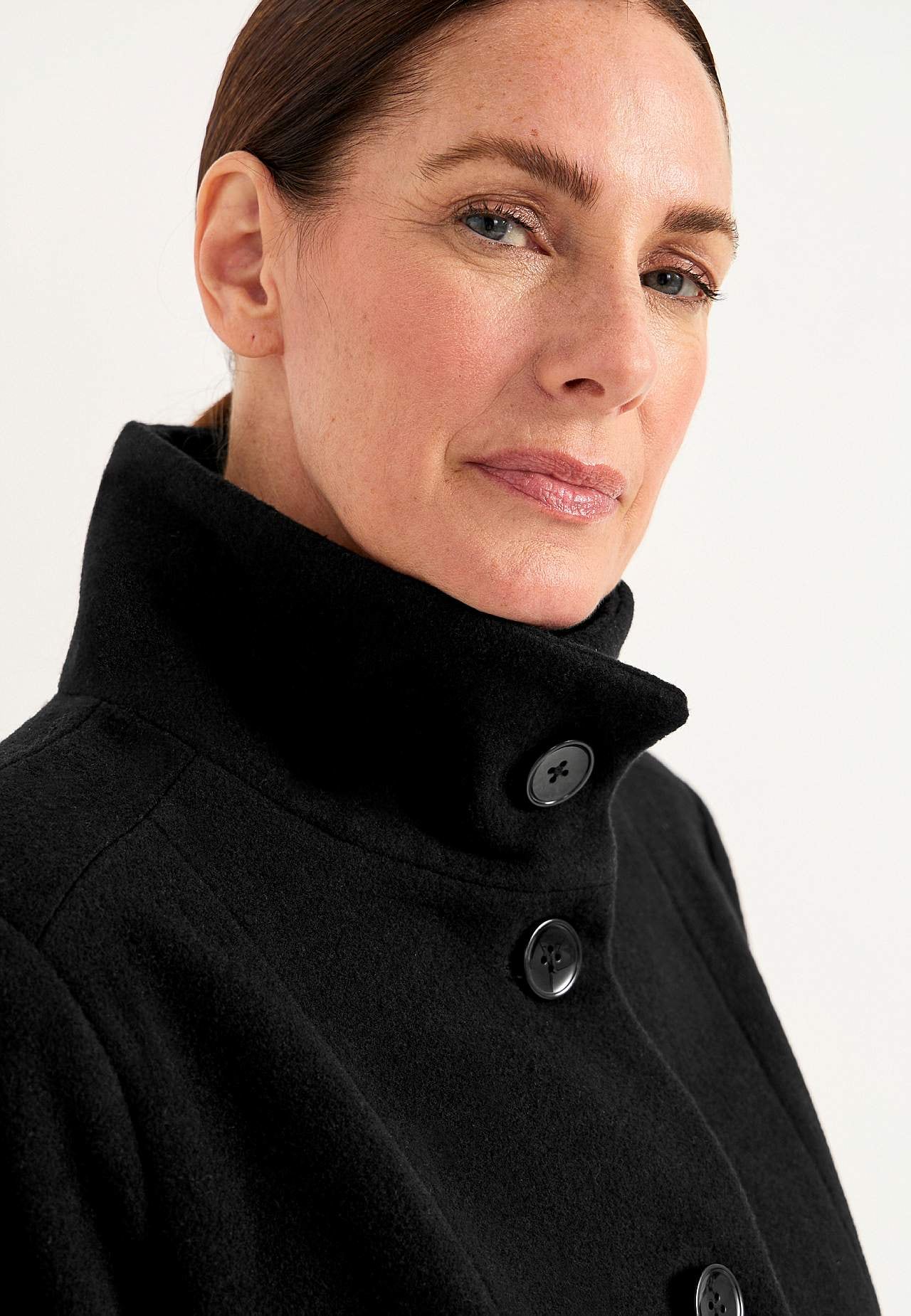Coat with stand-up collar