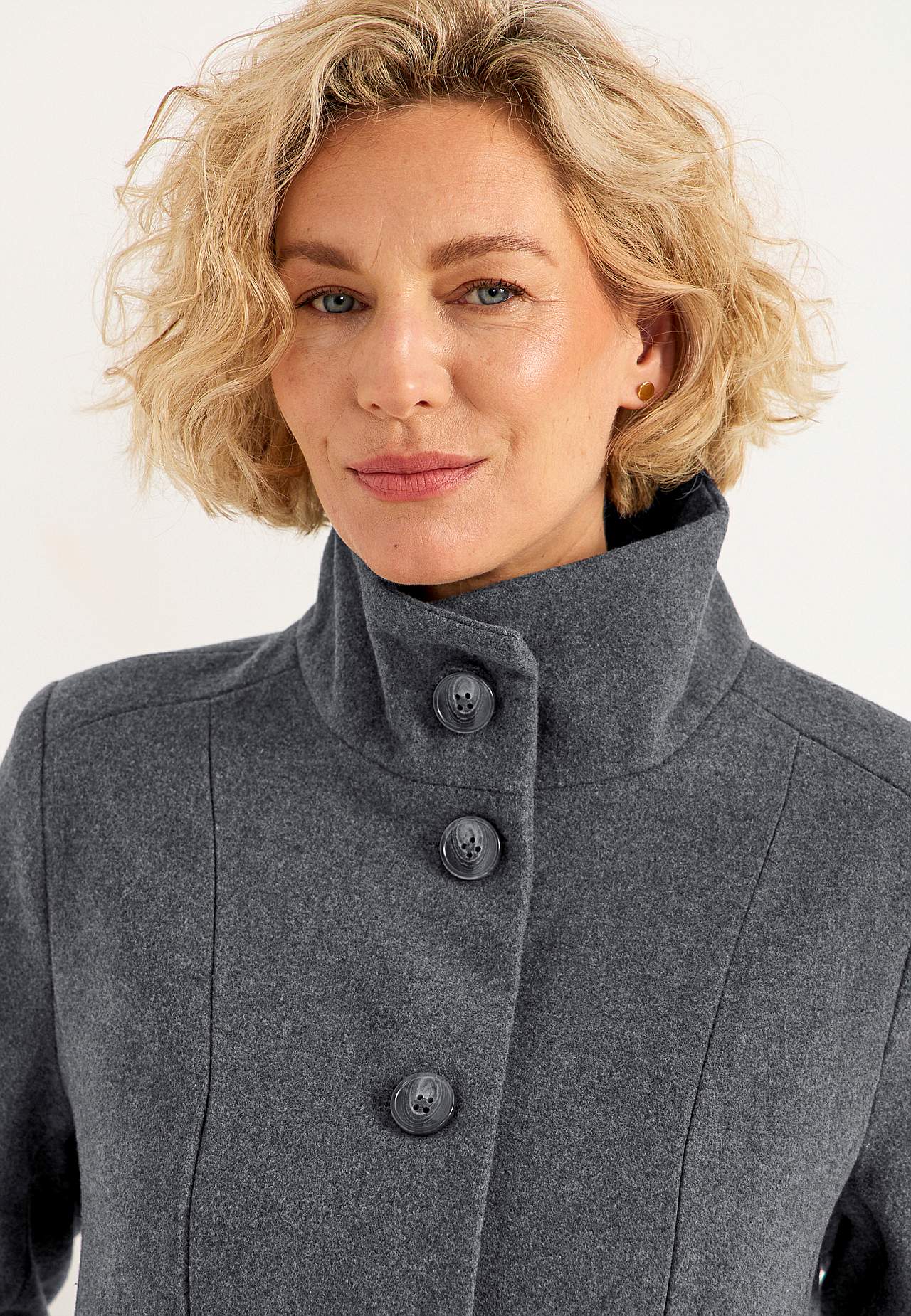 Coat with stand-up collar