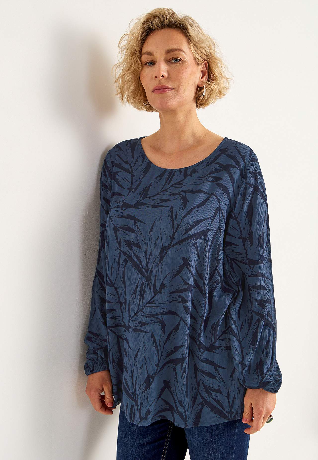 Tunic with textured weave fabric
