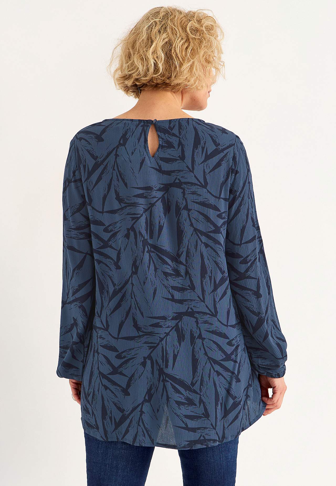 Tunic with textured weave fabric