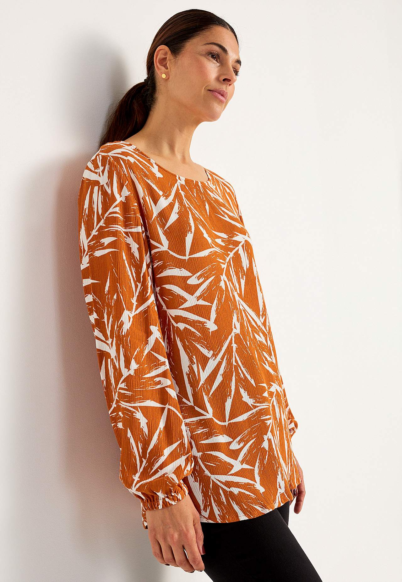 Tunic with textured weave fabric