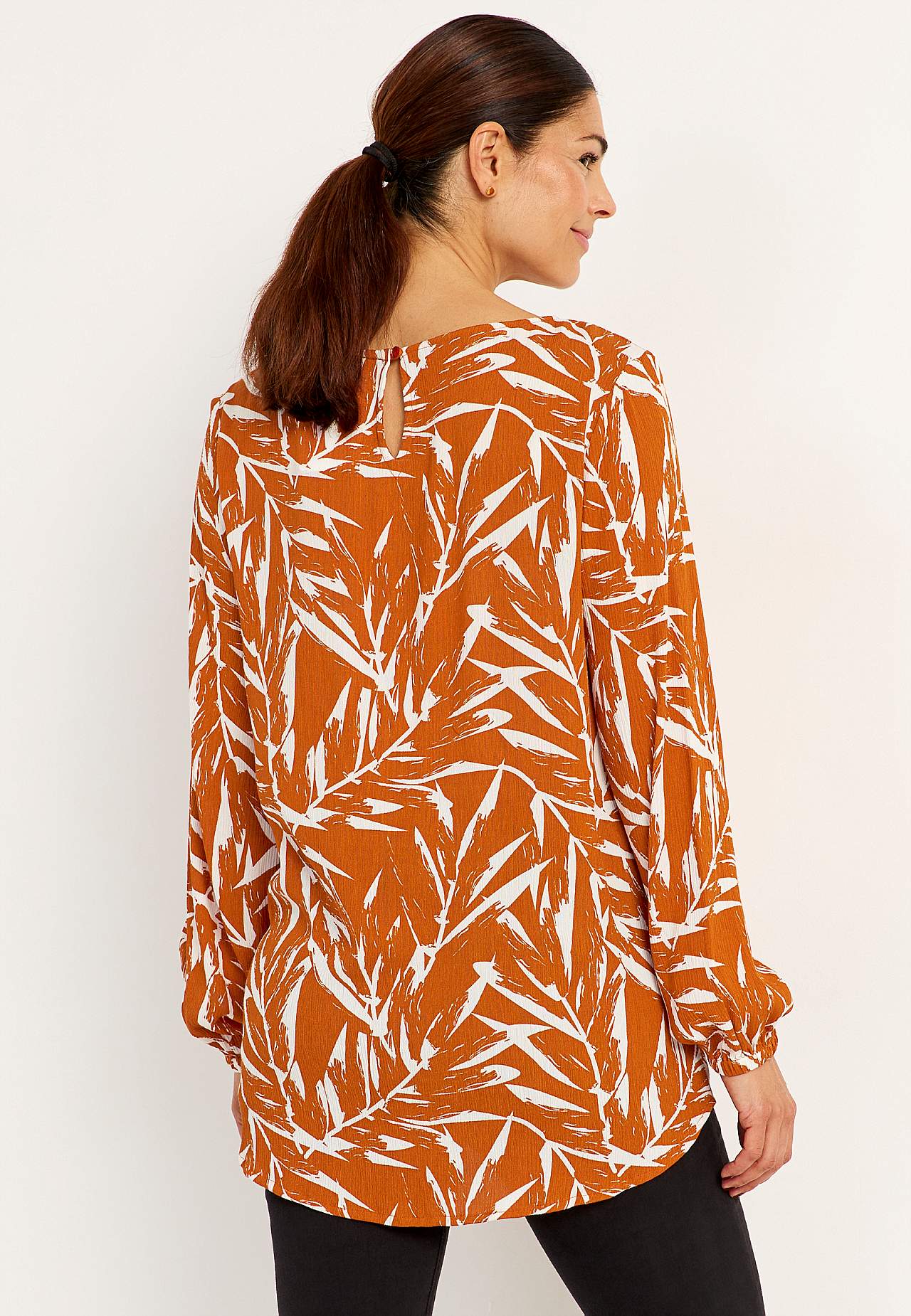Tunic with textured weave fabric