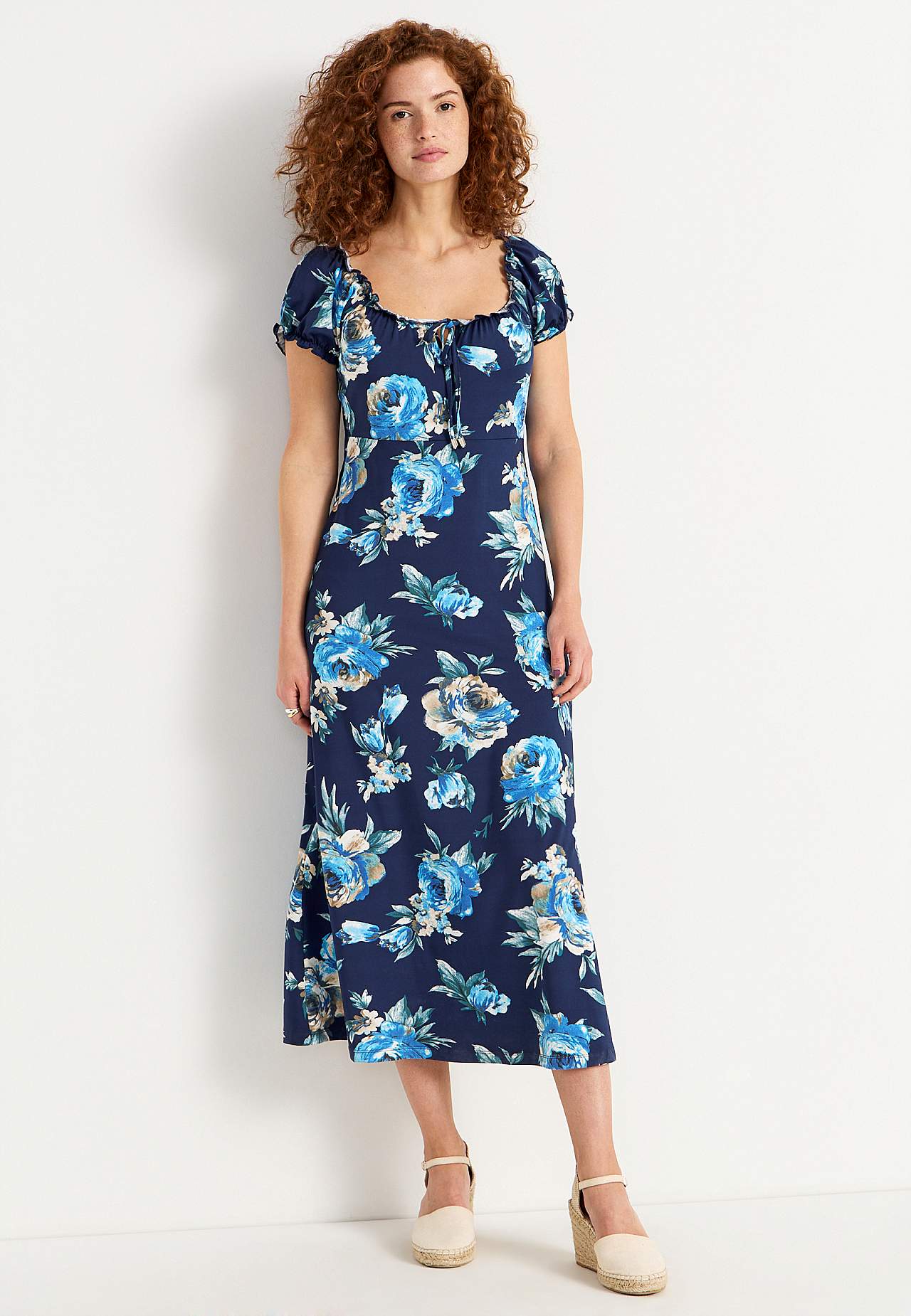 Long, patterned off-shoulder dress