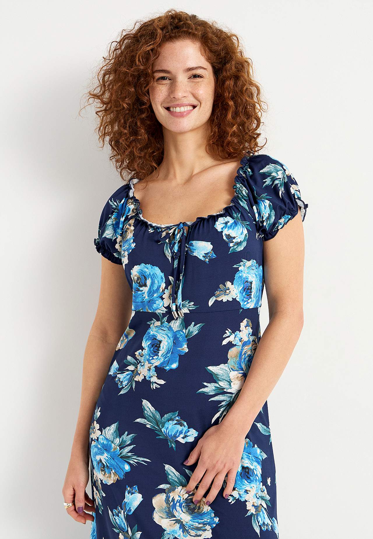Long, patterned off-shoulder dress