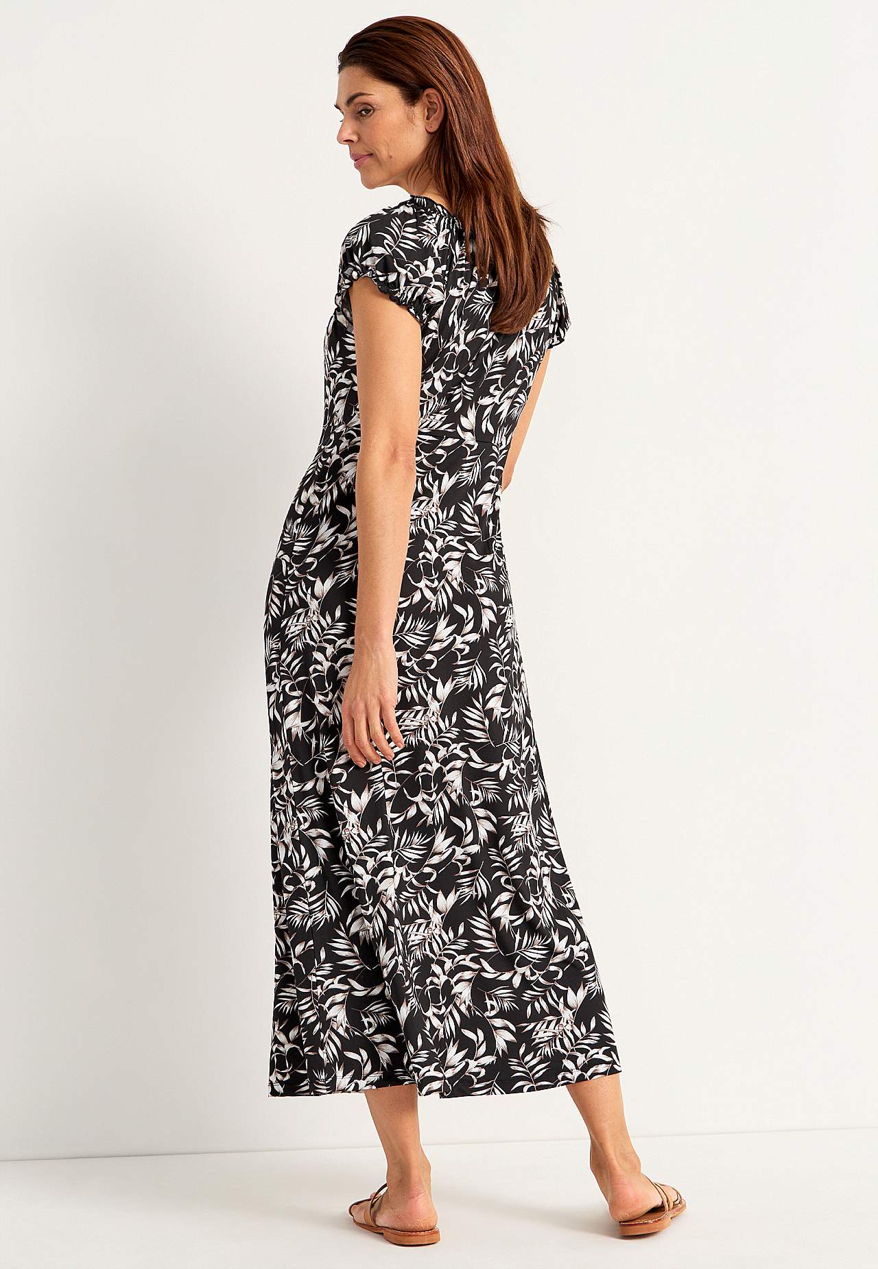 Long, patterned off-shoulder dress